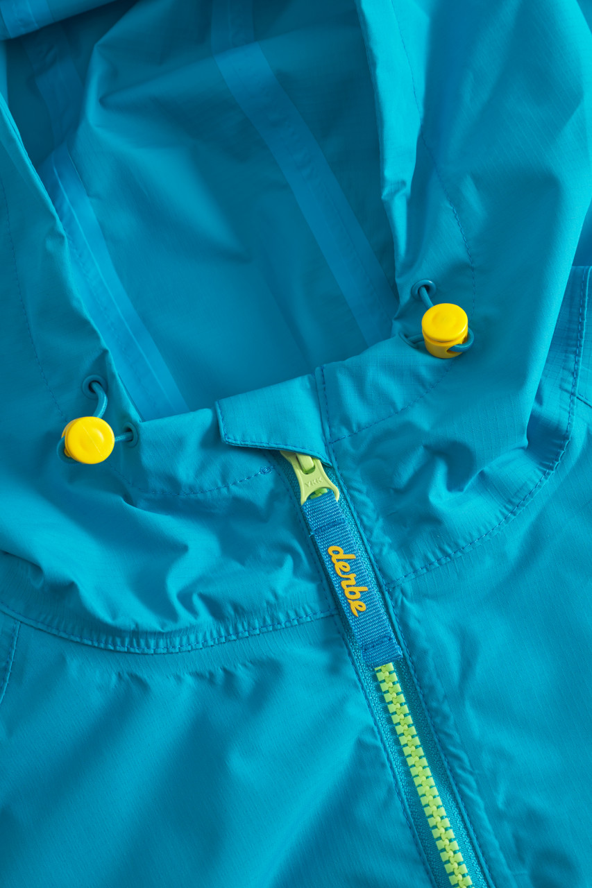 Derbe Regenjacke Kapby Damen Türkis Blau